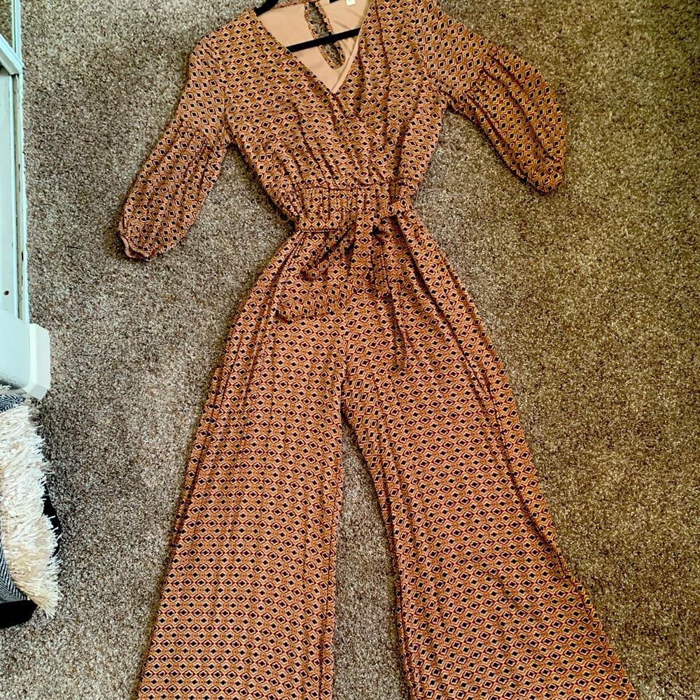 Francesca’s floor length jumpsuit size M